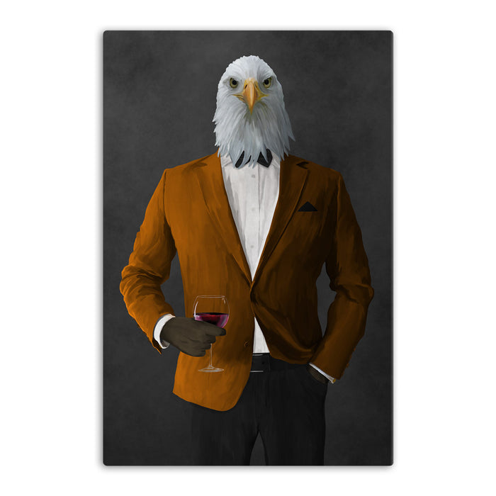 Bald eagle drinking red wine wearing orange and black suit canvas wall art