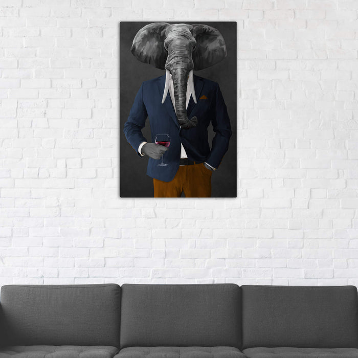 Elephant drinking red wine wearing navy and orange suit wall art in man cave
