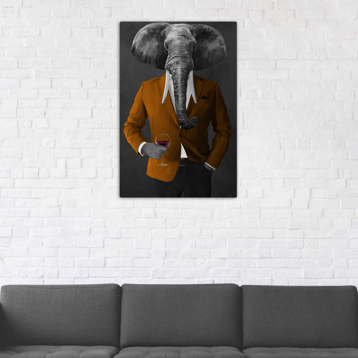 Elephant drinking red wine wearing orange and black suit wall art in man cave
